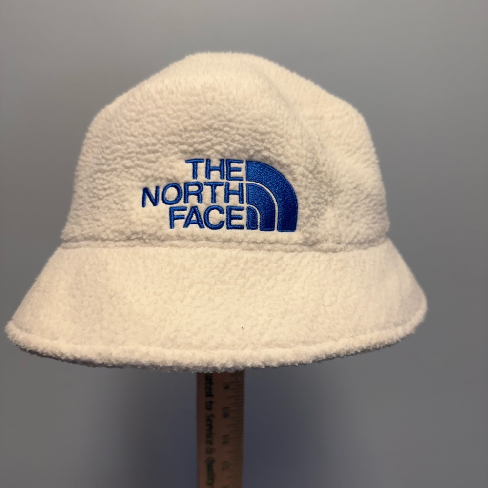 The North Face Cream Fleece Bucket Hat with Blue Logo